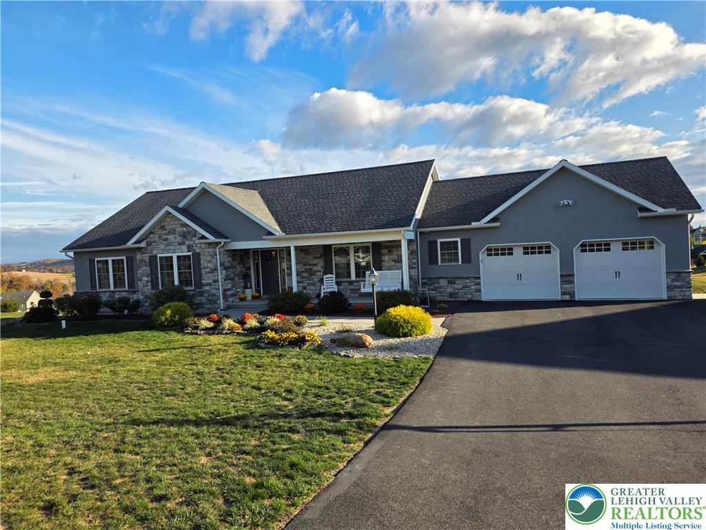 3393 Crestview Lane Walnutport, PA 18088 - Photo 3 of 68 a front view of house with yard outdoor seating and barbeque oven