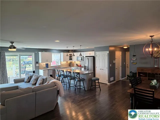 a bedroom with a bed and lamp