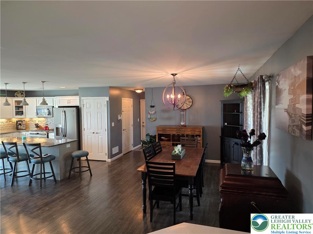 3393 Crestview Lane Walnutport, PA 18088 - Photo 33 of 68 a view of a dining room with furniture and wooden floor