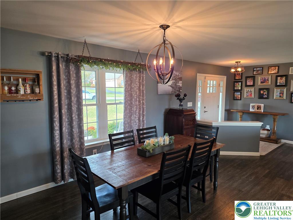 3393 Crestview Lane Walnutport, PA 18088 - Photo 36 of 68 a view of a dining room with furniture window and wooden floor