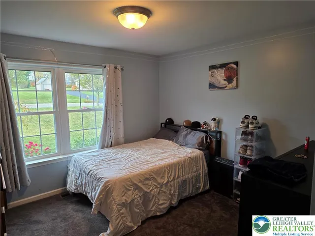 a view of a chairs and table in a room