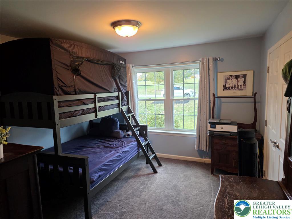3393 Crestview Lane Walnutport, PA 18088 - Photo 47 of 68 a bedroom with a bed and a window