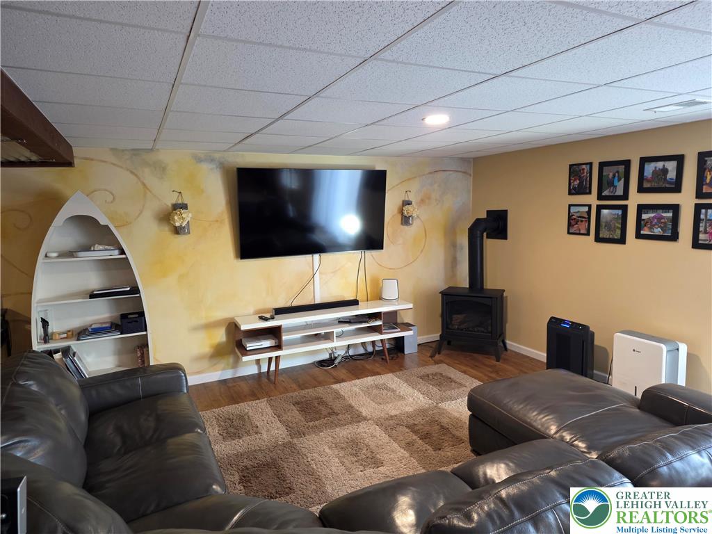 3393 Crestview Lane Walnutport, PA 18088 - Photo 52 of 68 a living room with furniture and a flat screen tv