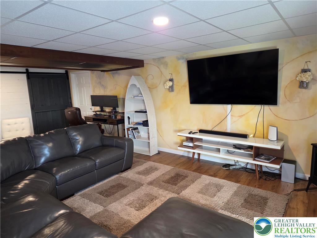 3393 Crestview Lane Walnutport, PA 18088 - Photo 53 of 68 a living room with furniture and a flat screen tv