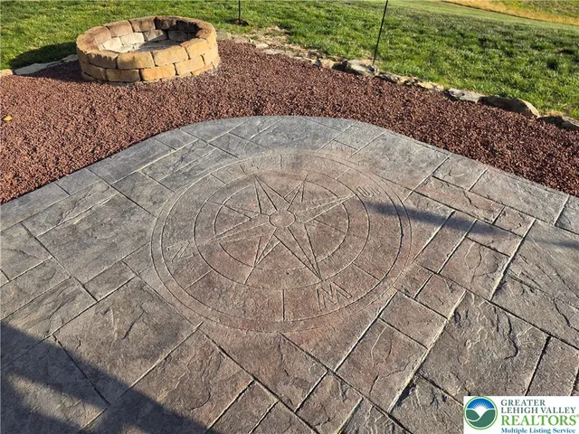 a view of a balcony with lake view and wooden floor