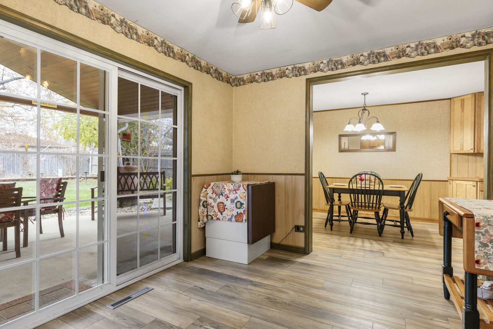 470 Oakwood Road Wauconda, IL 60084 - Photo 16 of 28 a view of a dining room with furniture and chandelier