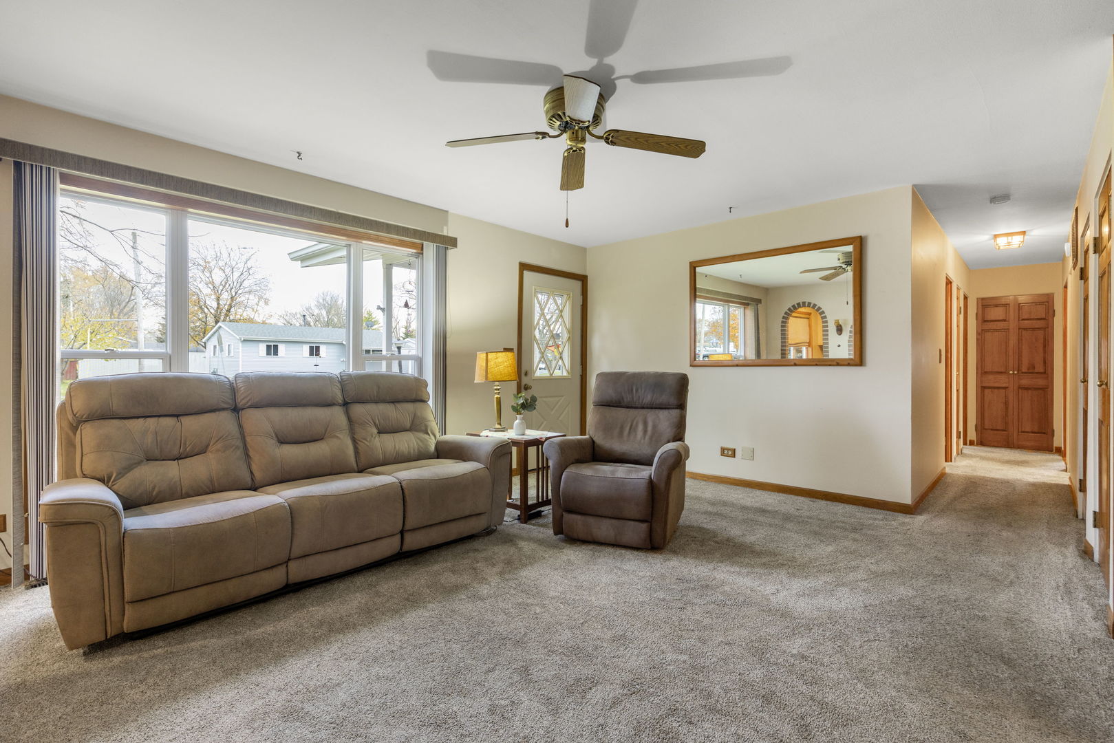 470 Oakwood Road Wauconda, IL 60084 - Photo 20 of 28 a living room with furniture and a large window