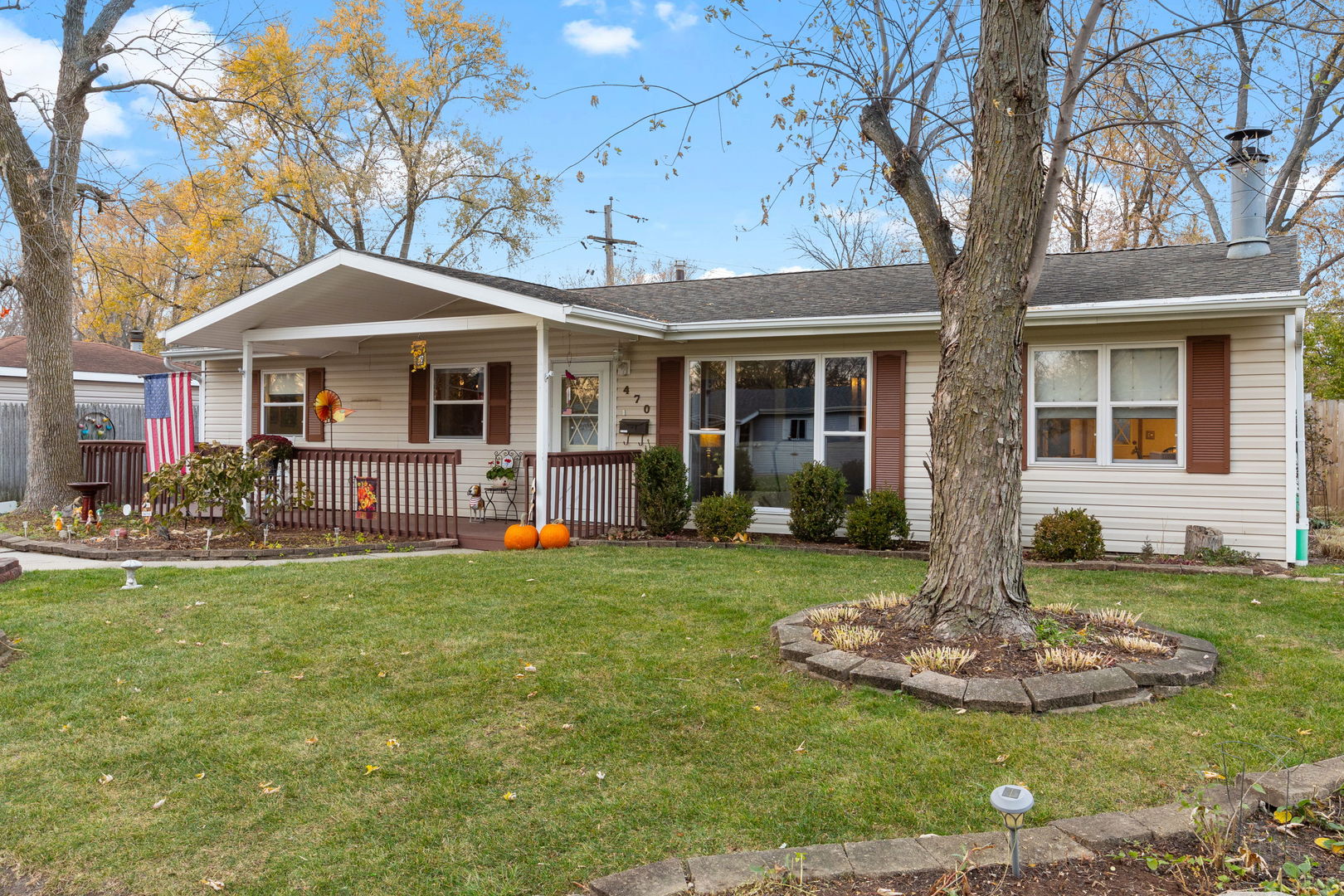 470 Oakwood Road Wauconda, IL 60084 - Photo 2 of 28 a front view of a house with yard and green space