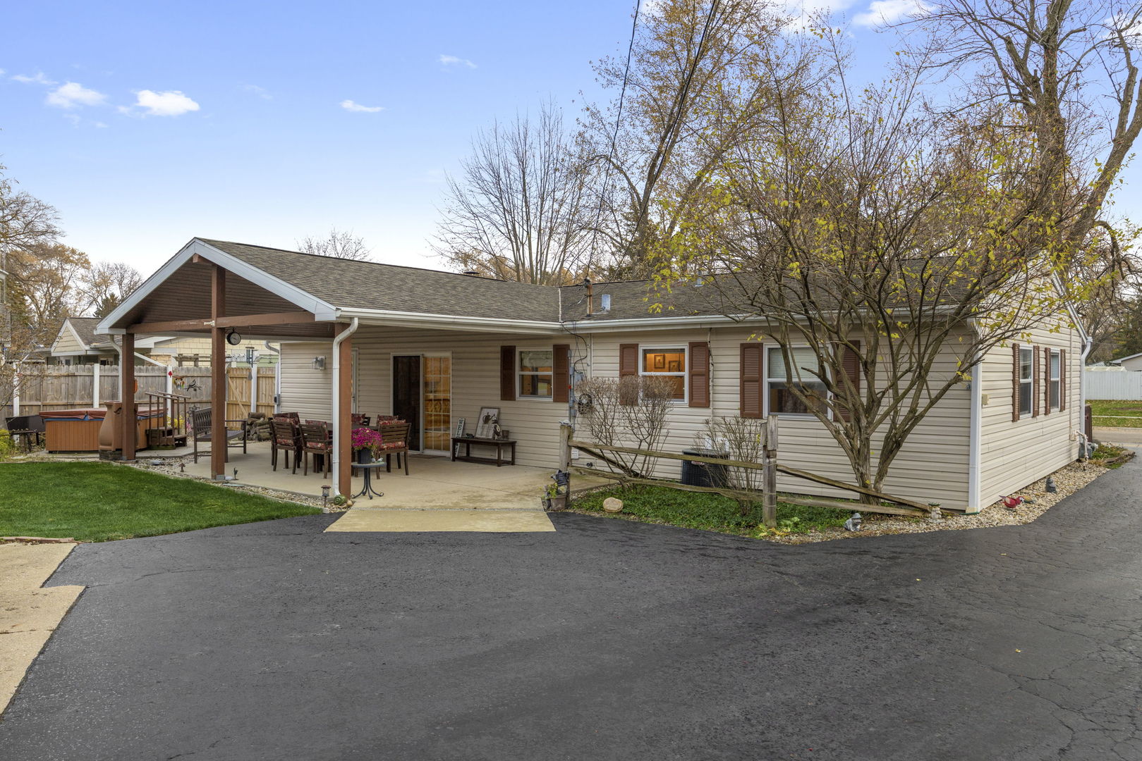 470 Oakwood Road Wauconda, IL 60084 - Photo 24 of 28 a front view of a house with a yard and porch