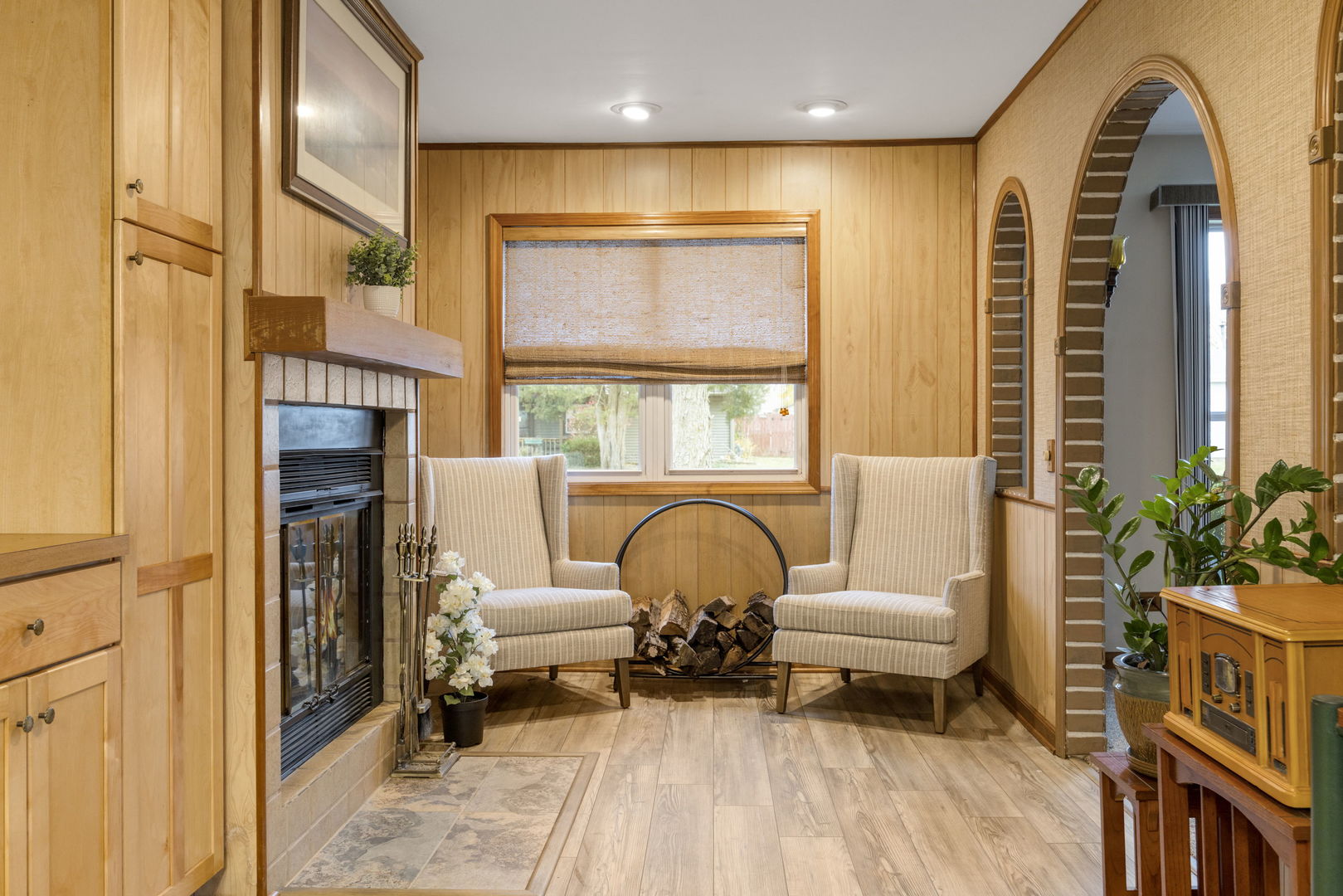 470 Oakwood Road Wauconda, IL 60084 - Photo 7 of 28 a living room with furniture and a fireplace