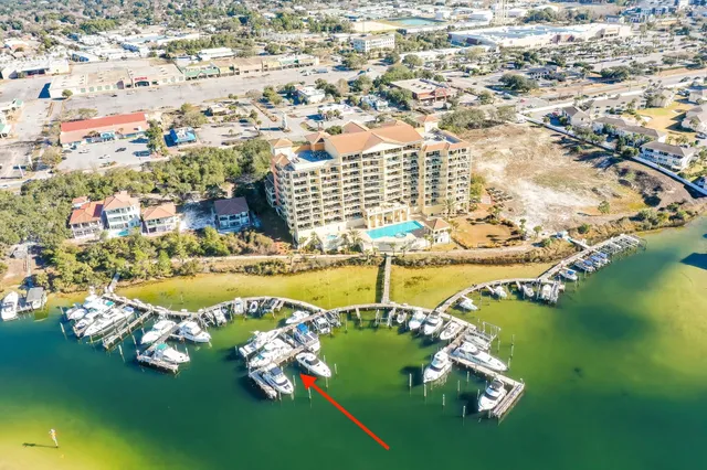 an aerial view of a house with a ocean view