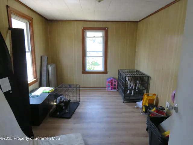 a room with furniture and a window