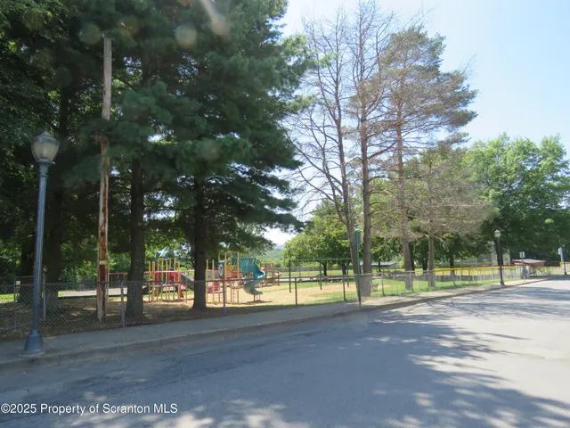 a view of road with trees