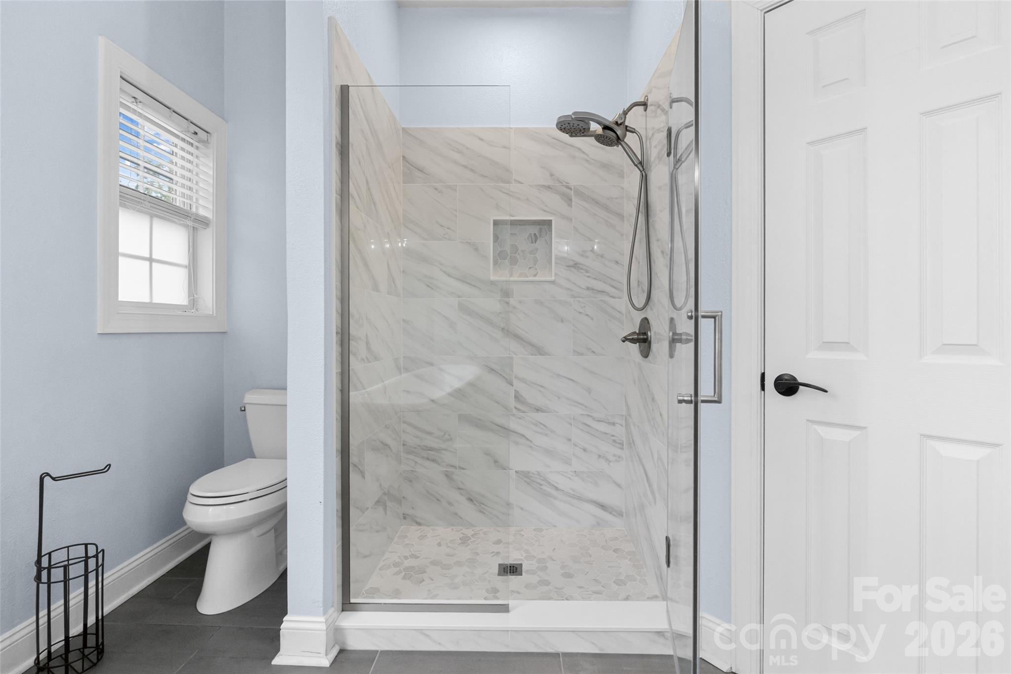 321 Forbes Court Clover, SC 29710 - Photo 15 of 31 a bathroom with a shower and toilet