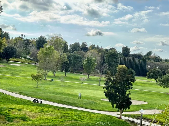 a view of a golf course with a garden