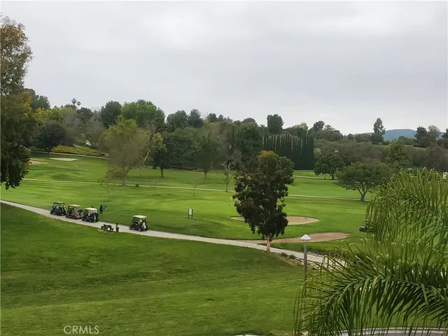 a view of a golf course with a garden