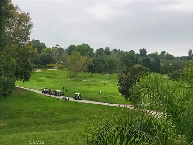 a view of a golf course with a garden