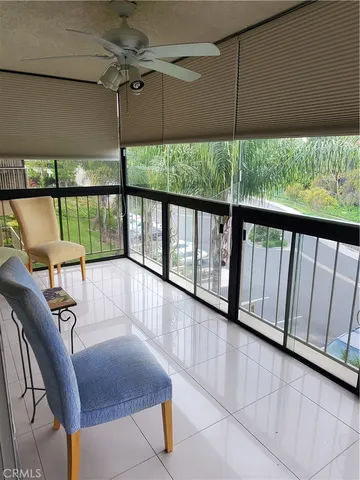 a view of balcony with furniture