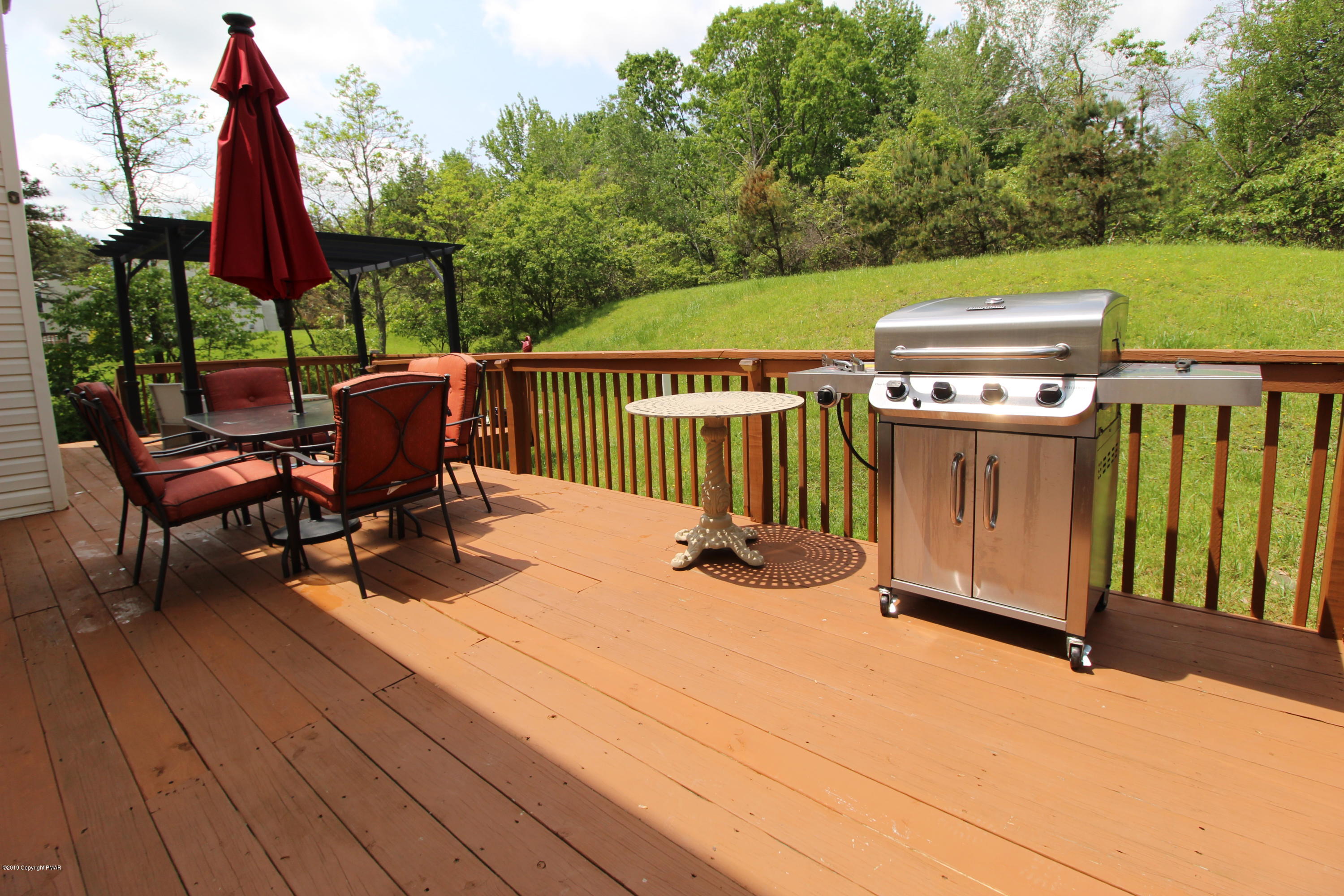 195 Granite Road Long Pond, PA 18334 - Photo 12 of 29 a view of a chairs and table in the patio
