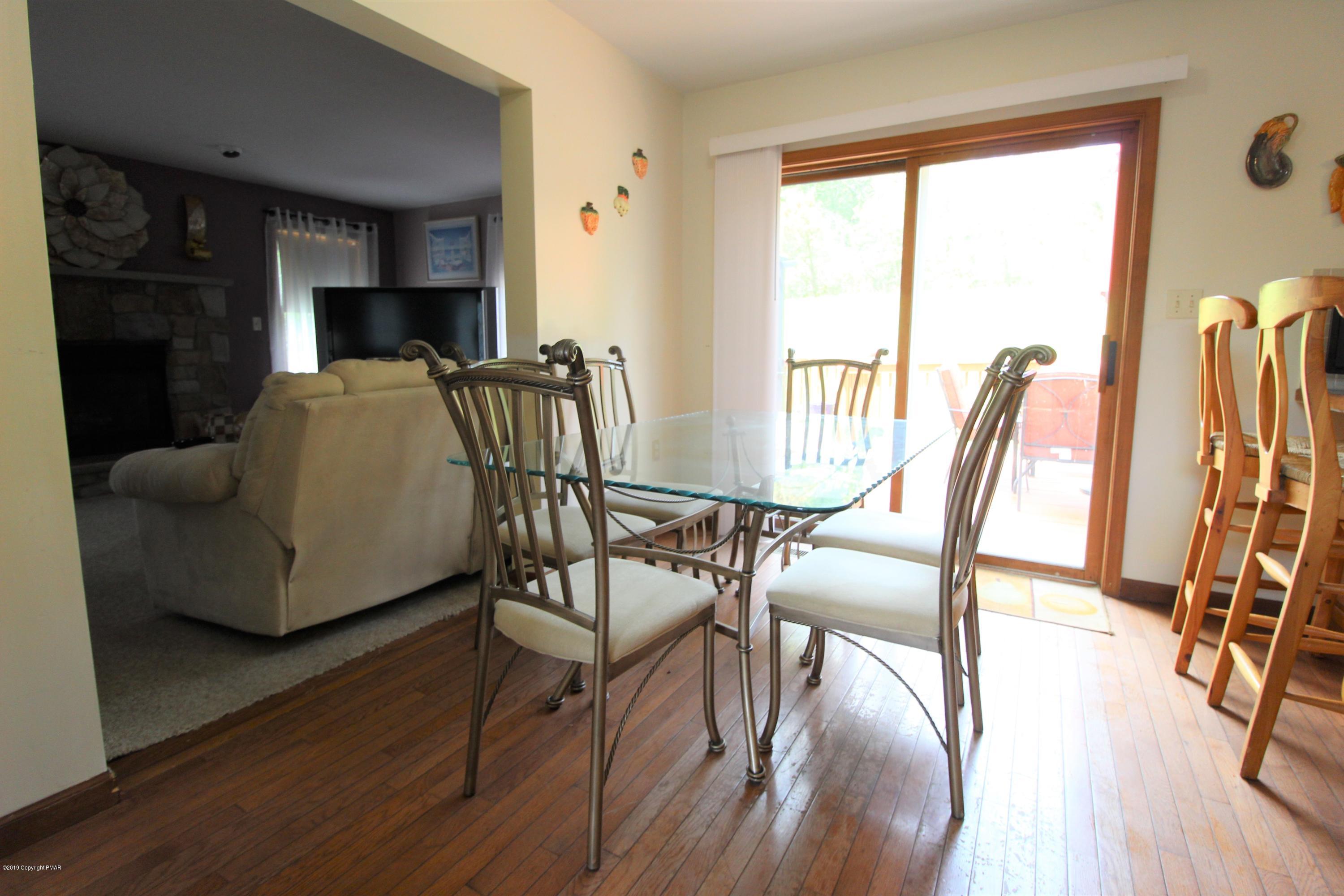 195 Granite Road Long Pond, PA 18334 - Photo 15 of 29 a dining room with furniture and wooden floor