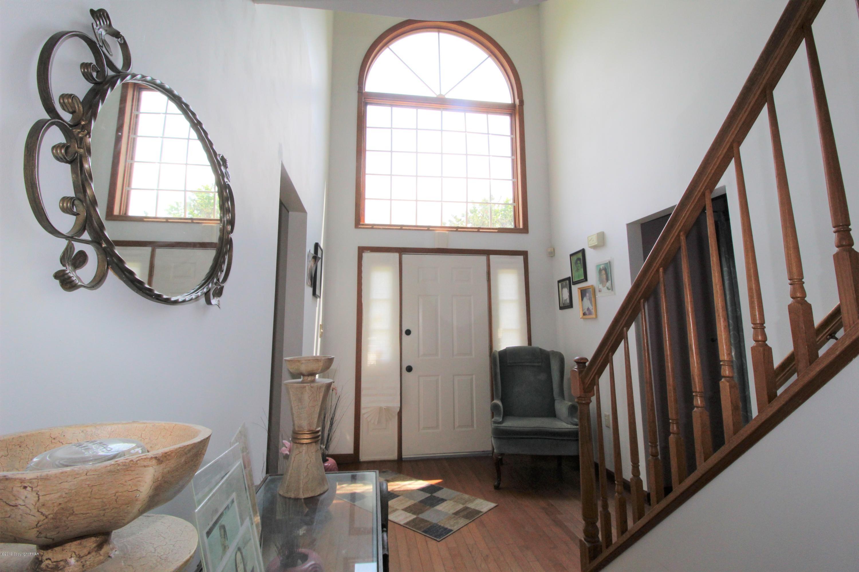195 Granite Road Long Pond, PA 18334 - Photo 16 of 29 a view of a livingroom with furniture window and wooden floor