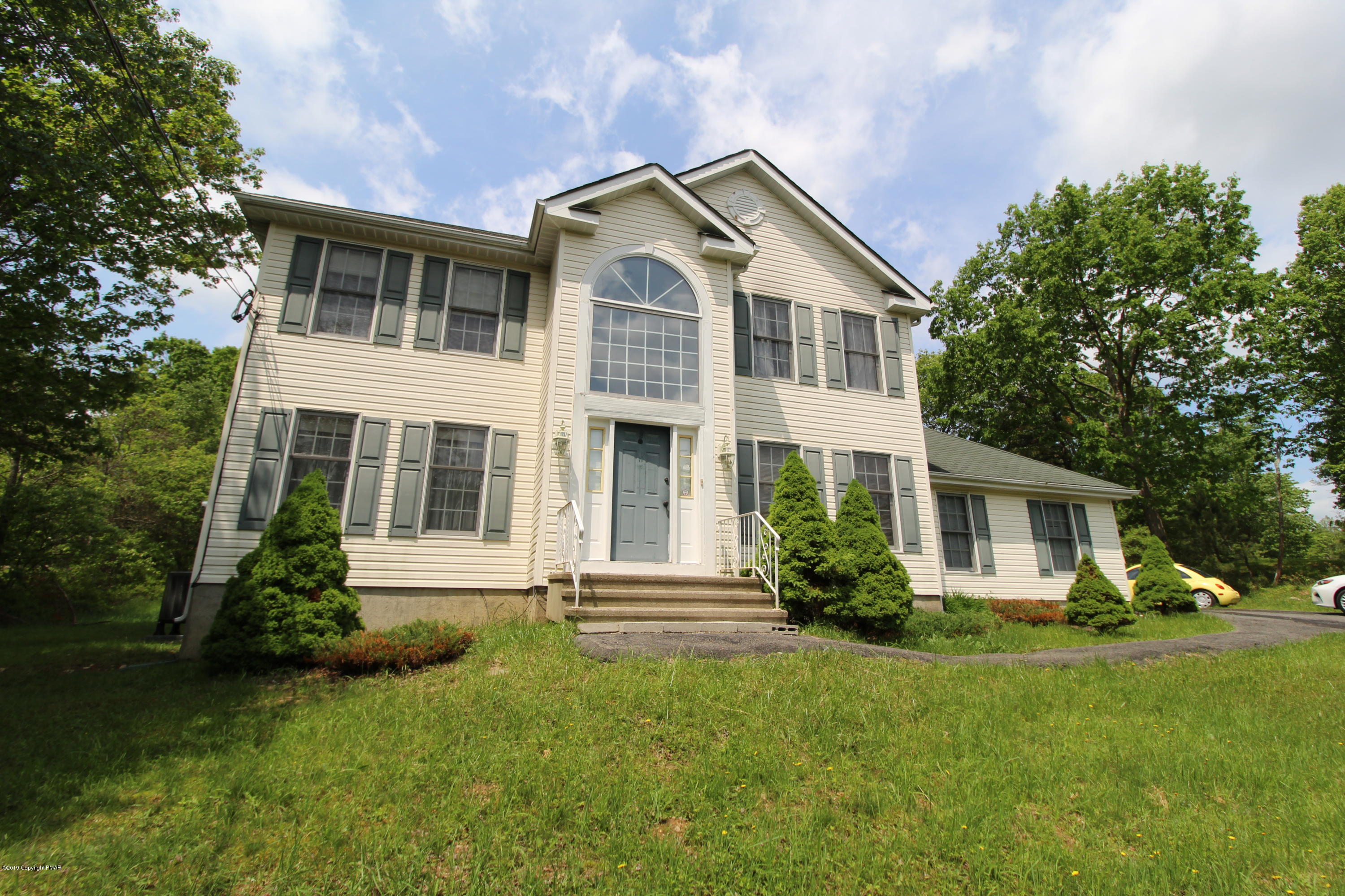 195 Granite Road Long Pond, PA 18334 - Photo 2 of 29 a front view of a house with a yard
