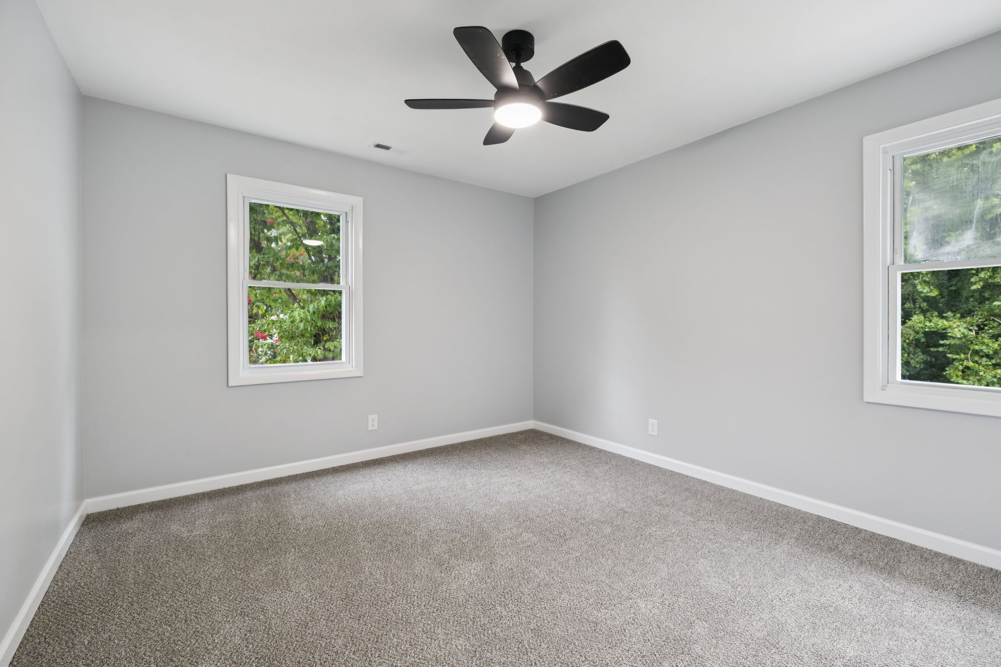 2009 7 Mile Ferry Road Clarksville, TN 37040 - Photo 15 of 31 an empty room with a window and a fan