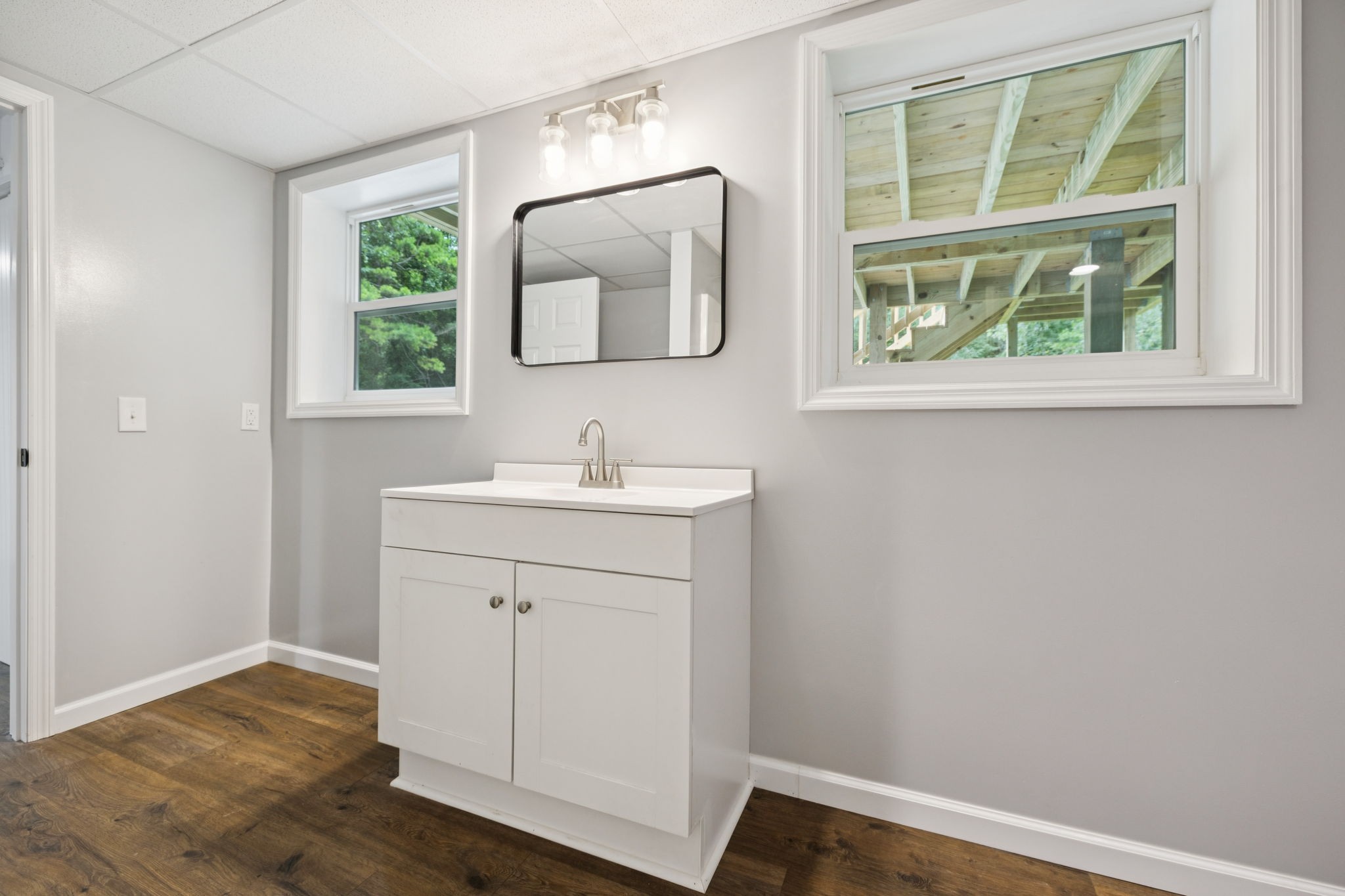 2009 7 Mile Ferry Road Clarksville, TN 37040 - Photo 19 of 31 a bathroom with a sink vanity and a mirror
