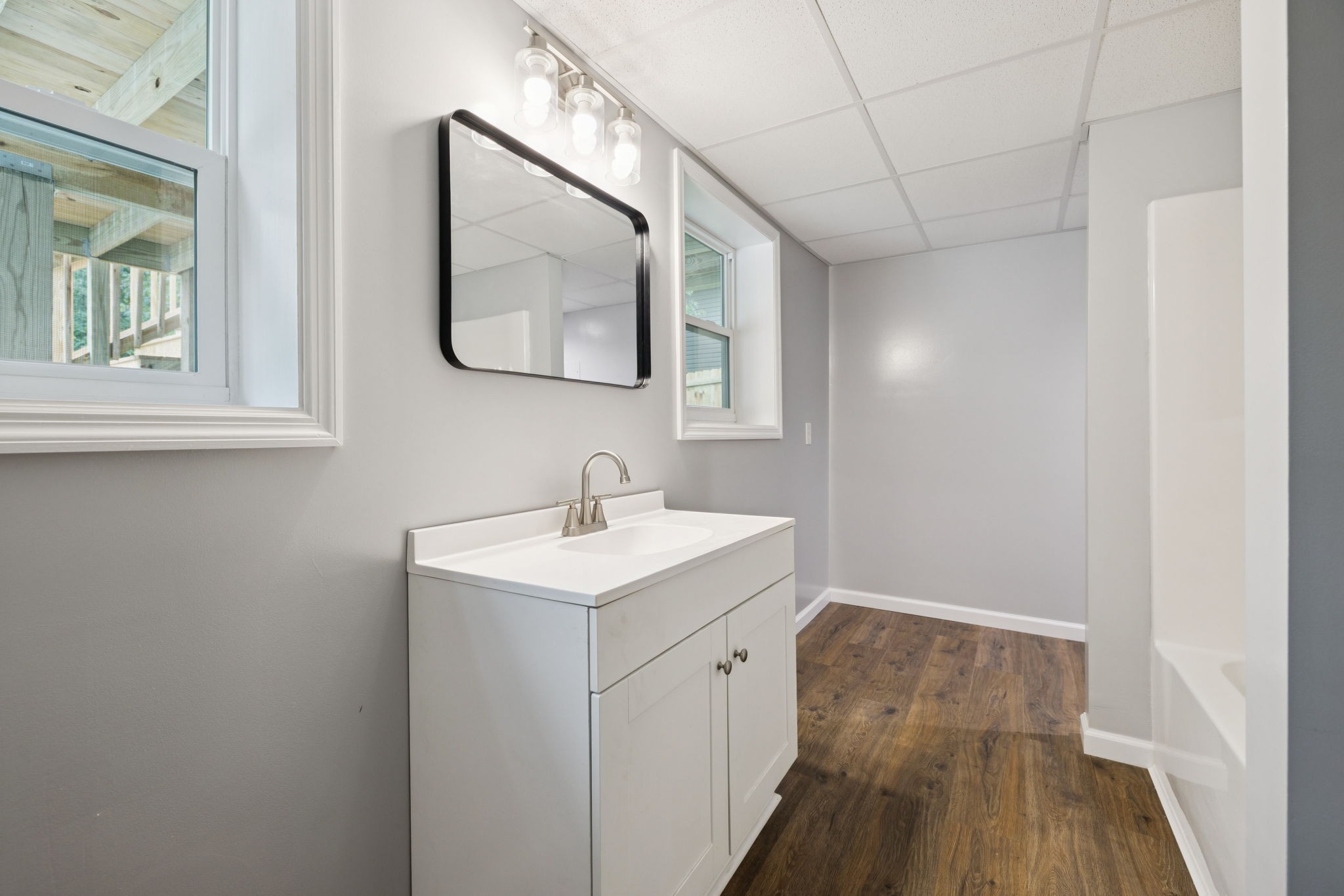 2009 7 Mile Ferry Road Clarksville, TN 37040 - Photo 20 of 31 a bathroom with a sink and a mirror