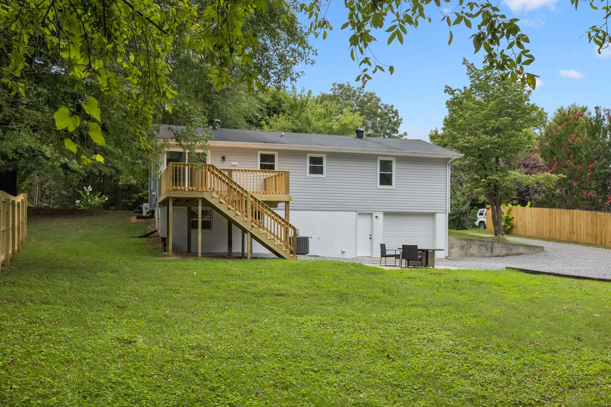 2009 7 Mile Ferry Road Clarksville, TN 37040 - Photo 26 of 31 a view of a house with a yard and sitting area