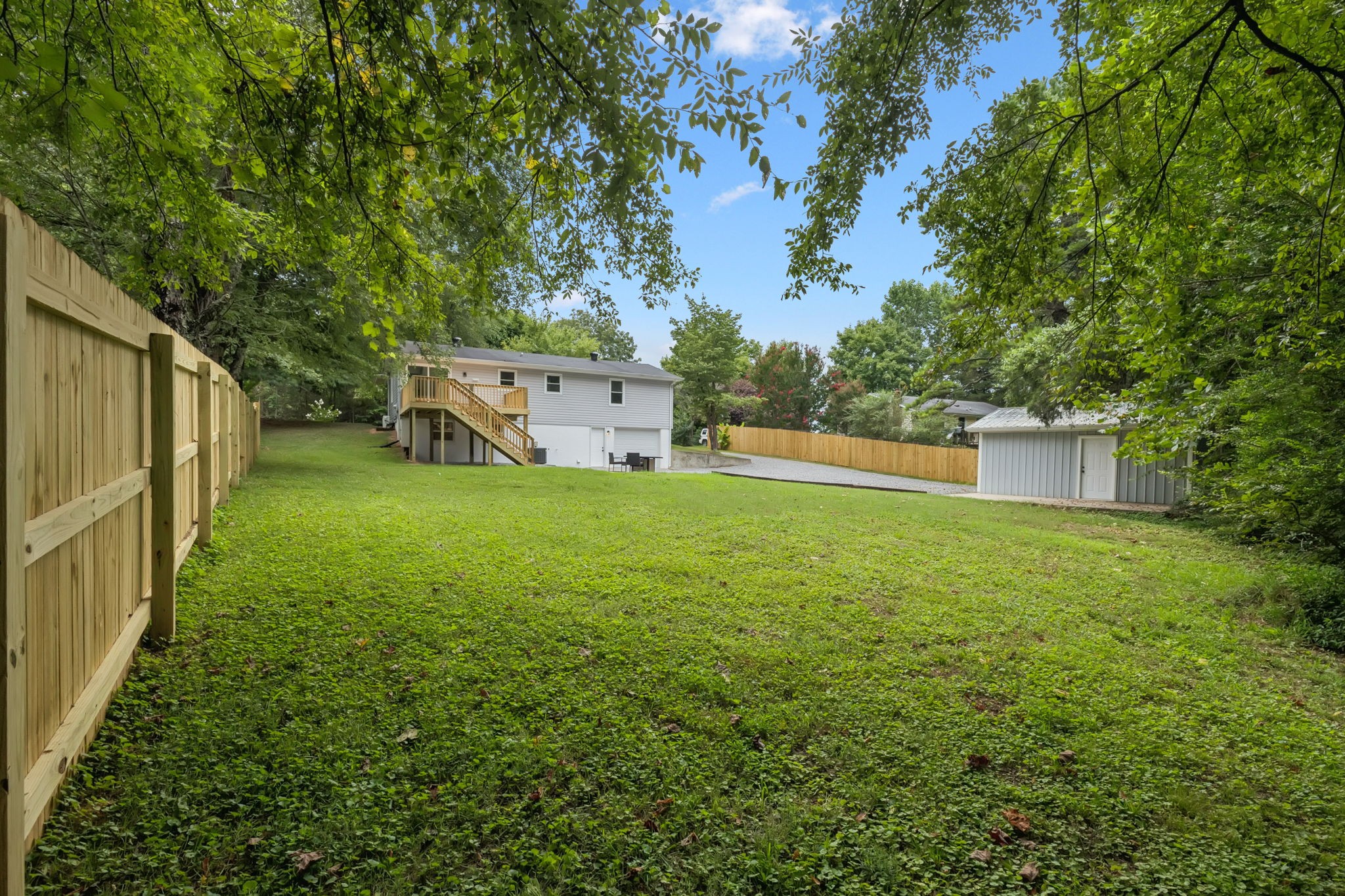 2009 7 Mile Ferry Road Clarksville, TN 37040 - Photo 30 of 31 a view of a backyard with large trees