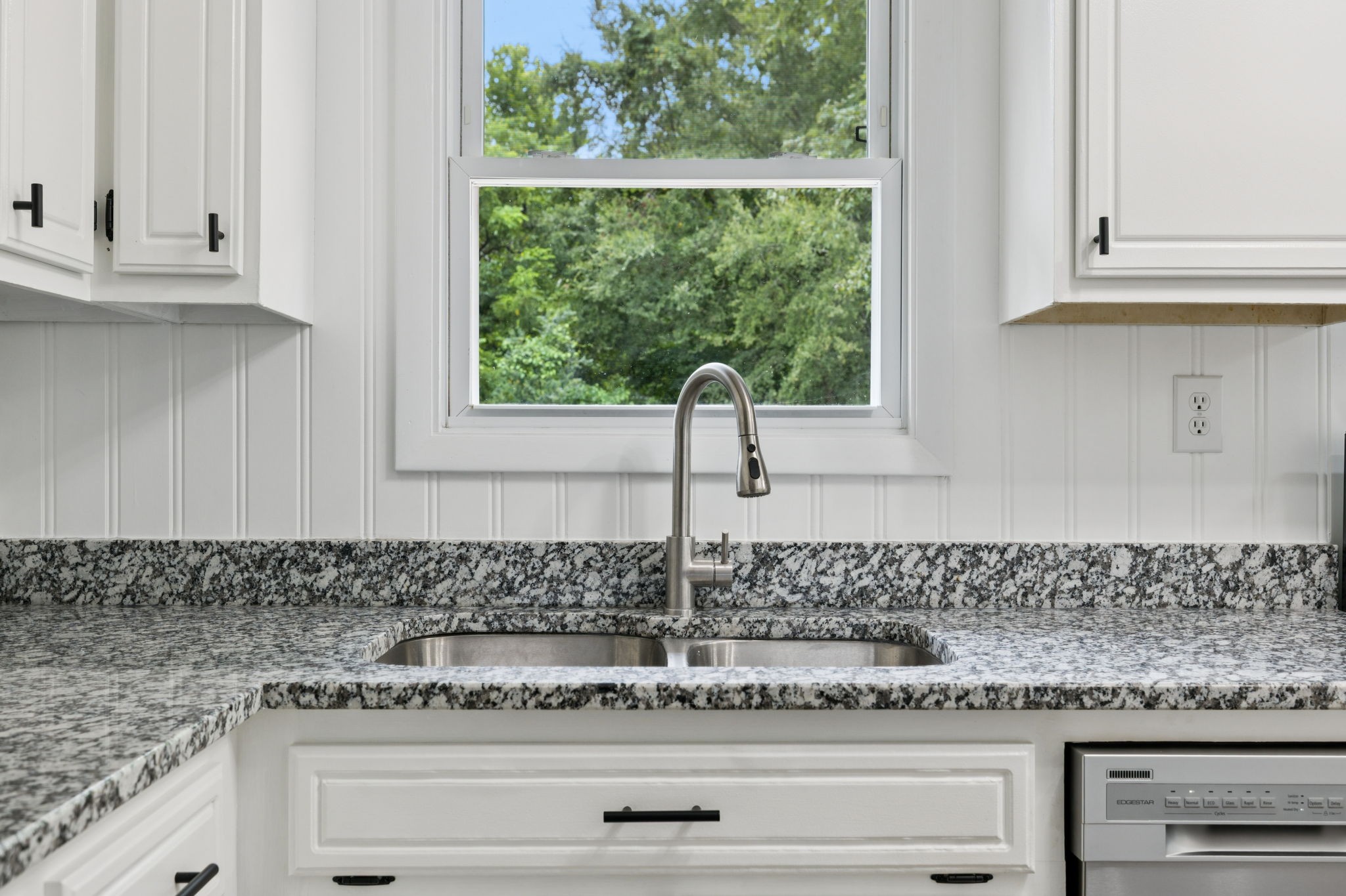 2009 7 Mile Ferry Road Clarksville, TN 37040 - Photo 9 of 31 a kitchen with granite countertop white cabinets and a window