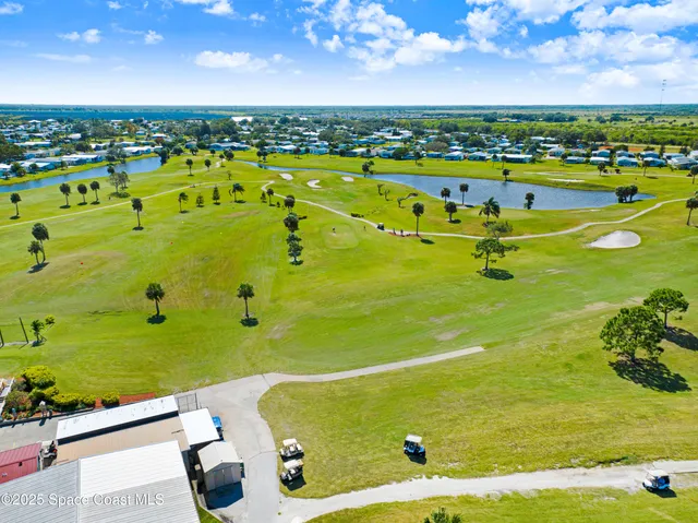 a view of a back yard of the house