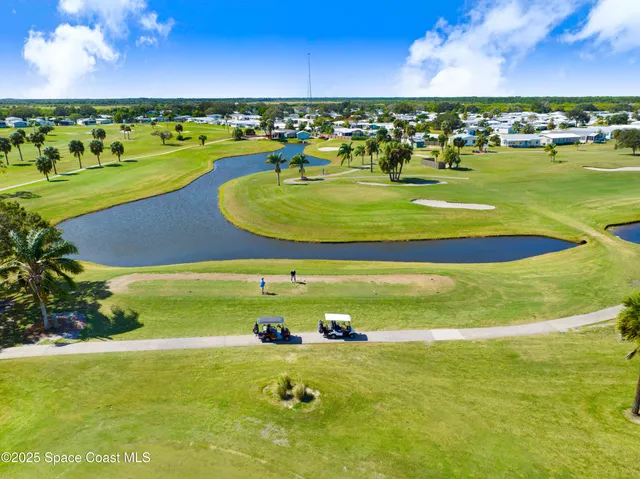 a view of an outdoor space patio water fountain and outdoor seating