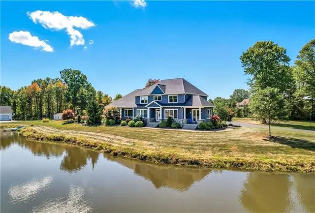 a view of a house with lake view