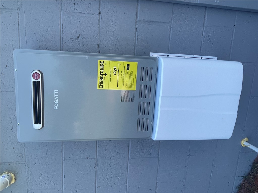 22 3rd Street Pendleton, SC 29670 - Photo 15 of 29 This modern water heater ensures efficient and continuous hot water for everyday comfort.