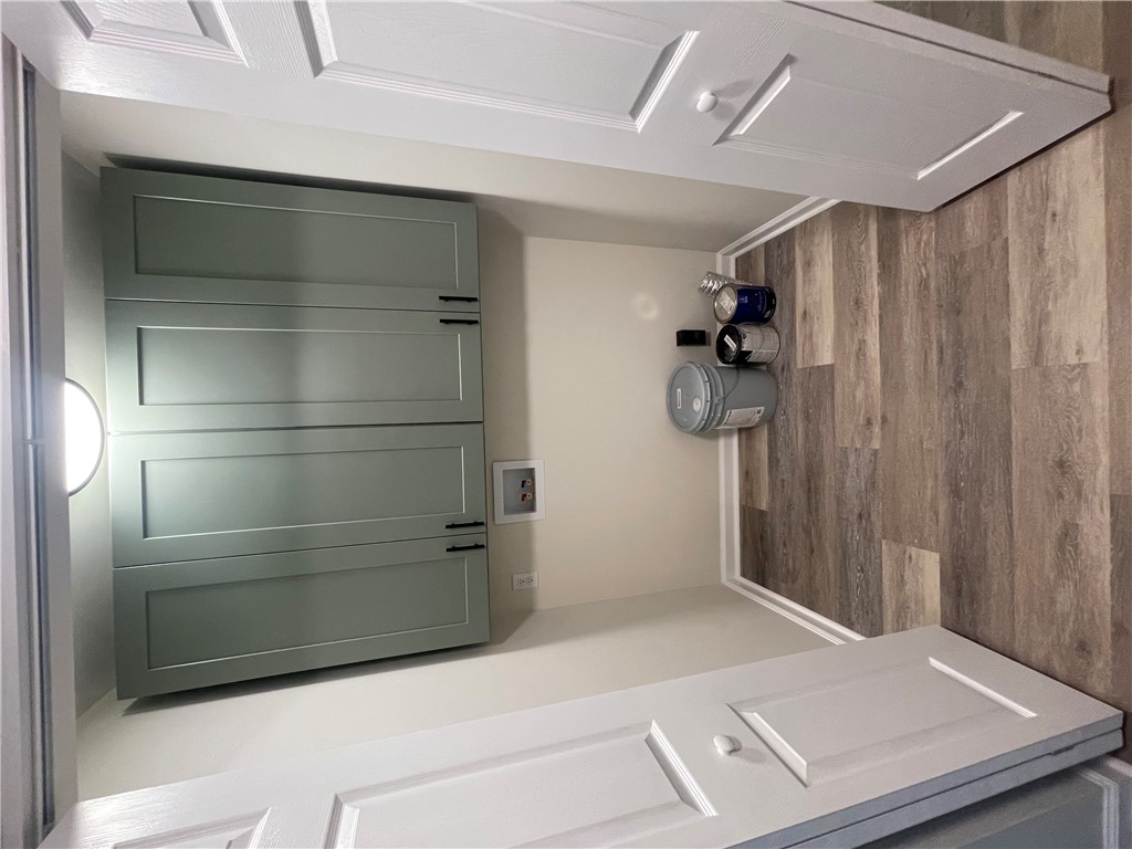 22 3rd Street Pendleton, SC 29670 - Photo 17 of 29 This dedicated laundry space offers practical convenience for daily tasks.