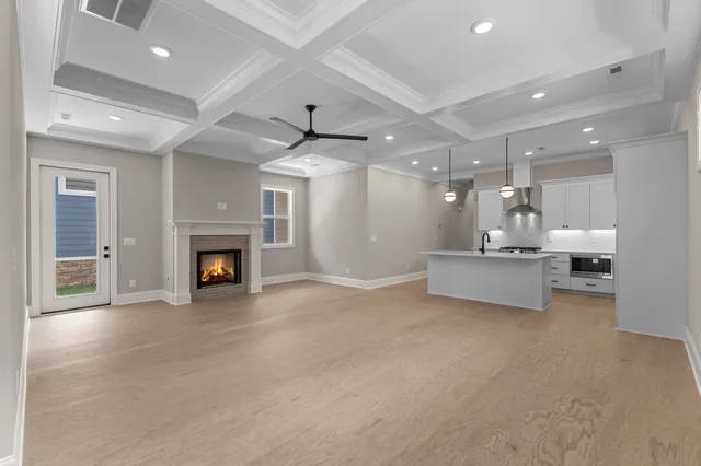 a living room with a fireplace and a couch