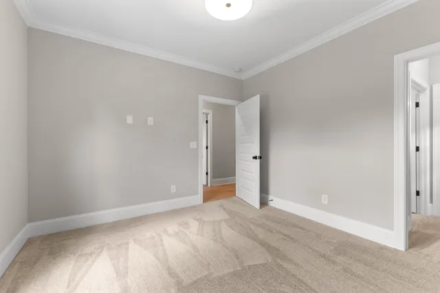wooden floor and closet area in a room