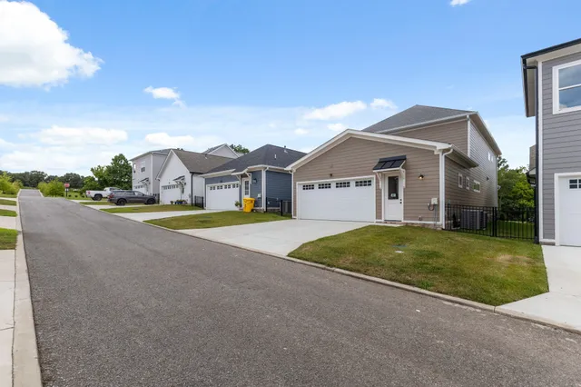 a view of street with houses