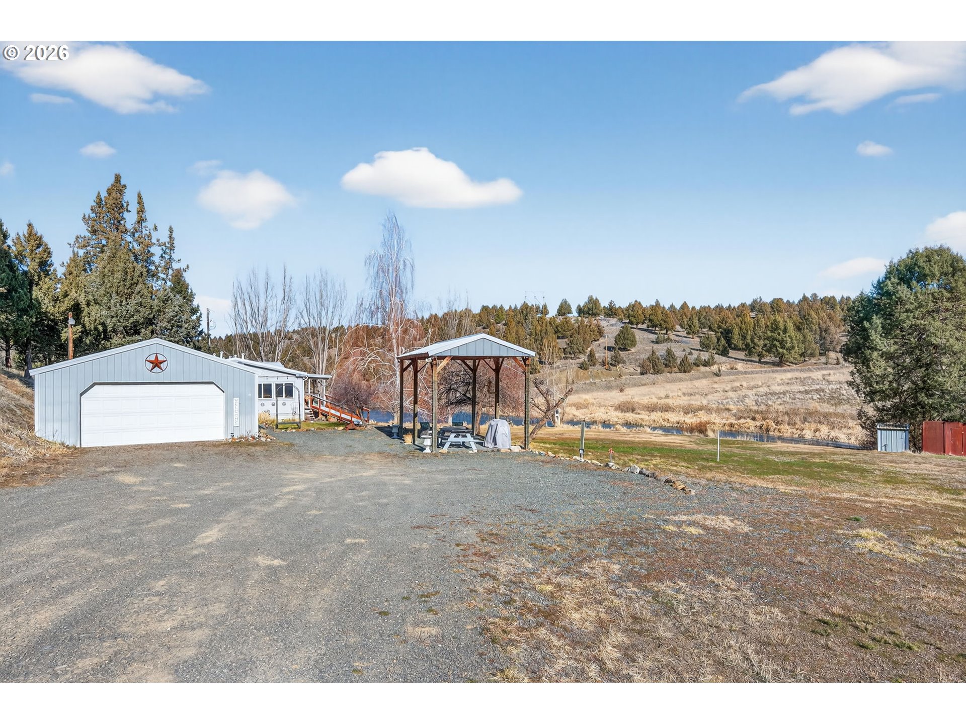 26548 County Road 74G John Day, OR 97845 - Photo 3 of 44 a view of a house with outdoor space and sitting area