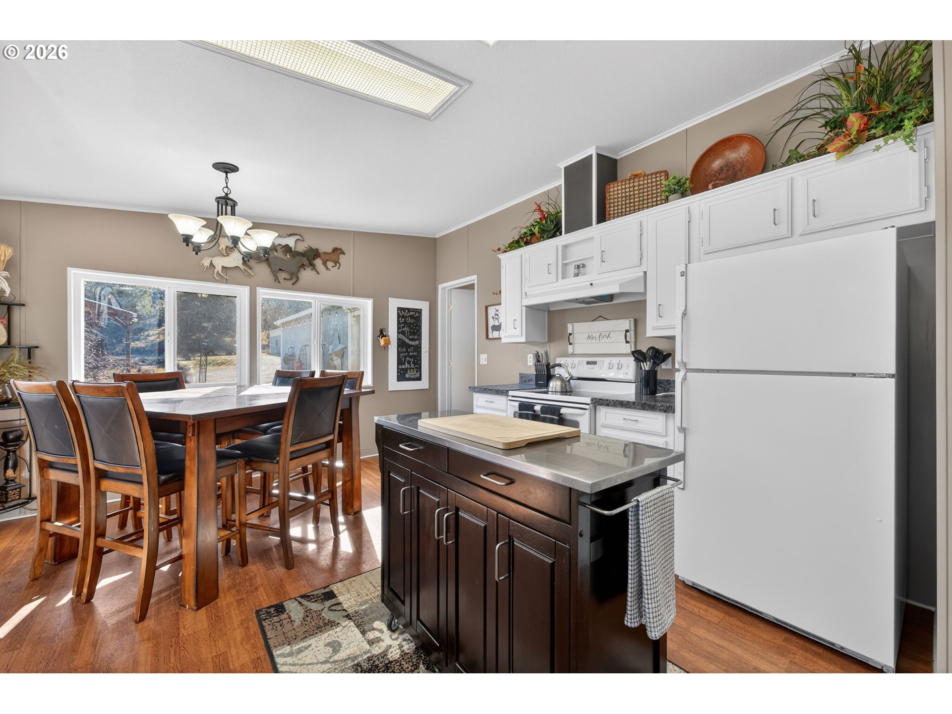 26548 County Road 74G John Day, OR 97845 - Photo 6 of 44 a kitchen with cabinets and wooden floor