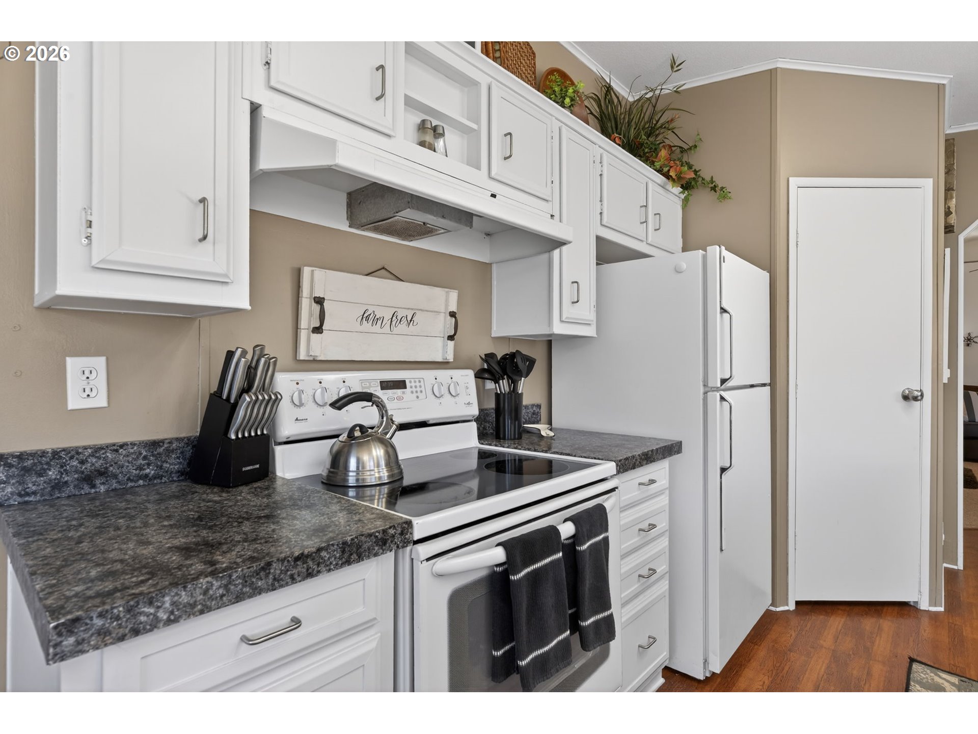 26548 County Road 74G John Day, OR 97845 - Photo 8 of 44 a kitchen with stainless steel appliances granite countertop a refrigerator sink and cabinets