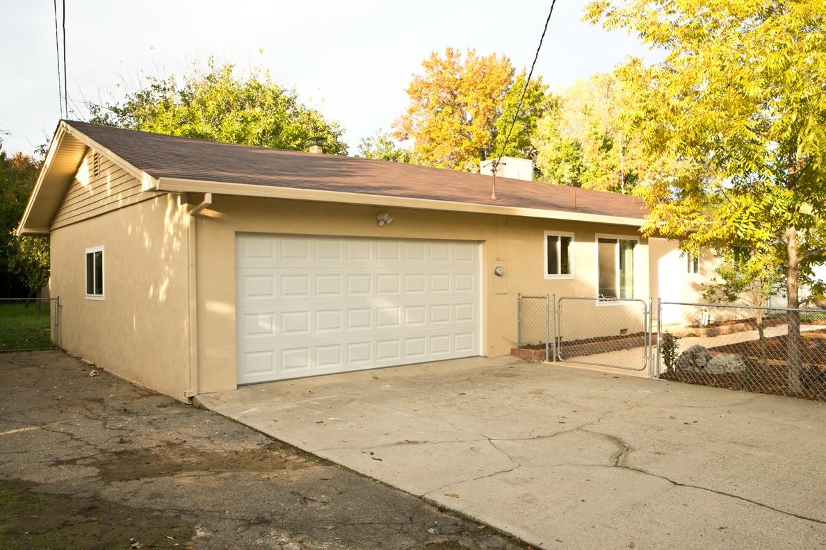 4370 East Bonnyview Road Redding, CA 96001 - Photo 3 of 19 Front w/new roll up garage door