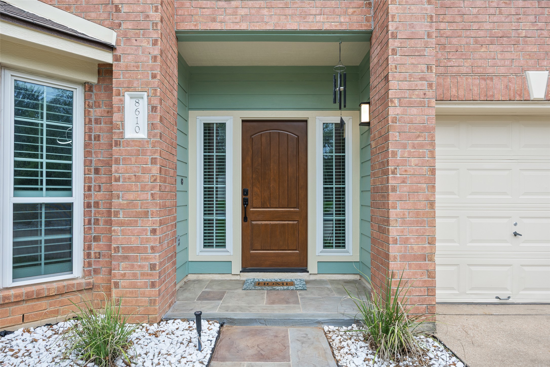8610 Axis Drive Austin, TX 78749 - Photo 10 of 29 a front view of a house with a door