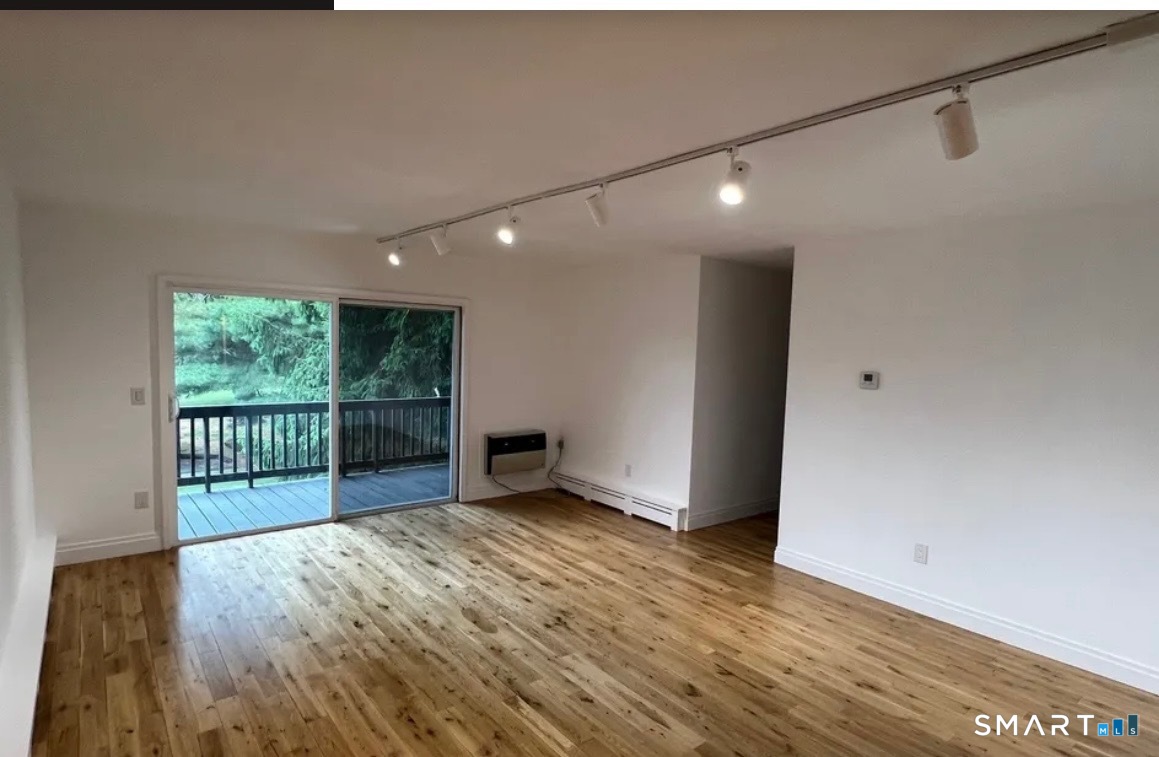 67 Balance Rock Road, Unit 7 Seymour, CT 06483 - Photo 6 of 12 a view of entryway with wooden floor