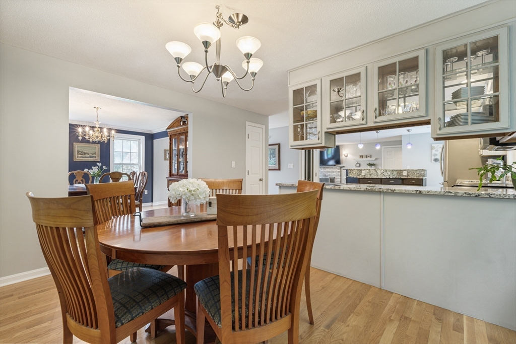 2 Gerald Avenue Millis, MA 02054 - Photo 14 of 38 a view of a dining room with furniture and chandelier