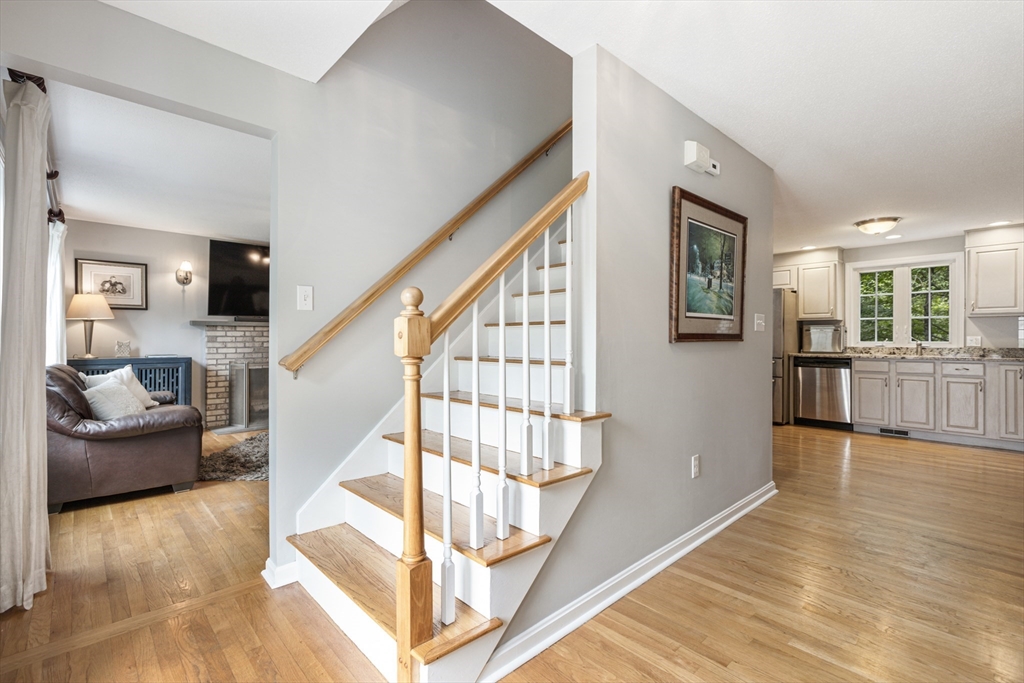 2 Gerald Avenue Millis, MA 02054 - Photo 3 of 38 a view of entryway and hall with wooden floor