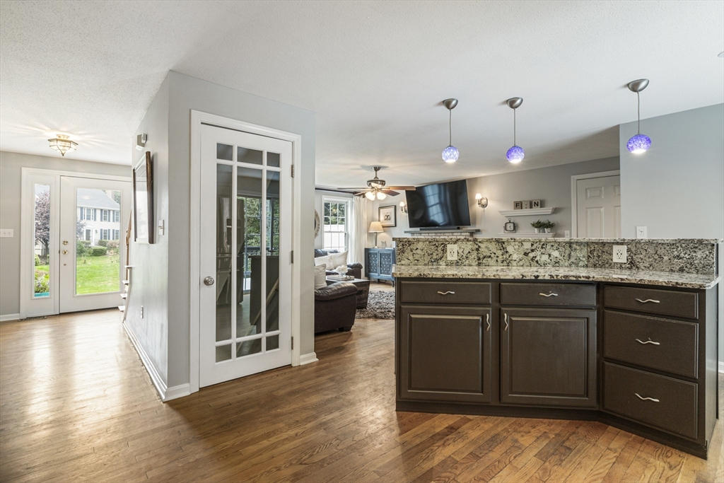 2 Gerald Avenue Millis, MA 02054 - Photo 7 of 38 a kitchen with a sink and a stove