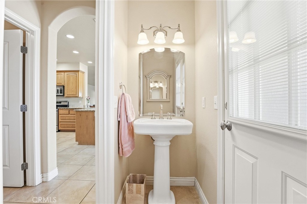 5773 Merito Road Hesperia, CA 92344 - Photo 22 of 33 Guest Half Bathroom